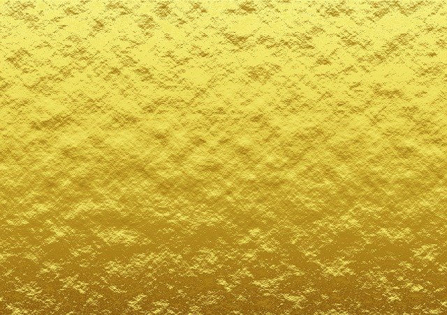 Imagen de un fondo con textura rugosa de color amarillo